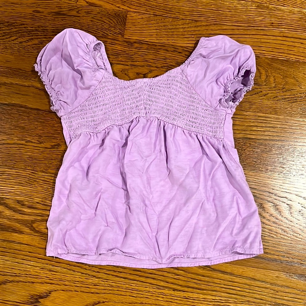 Purple shirt with puff sleeves, art class